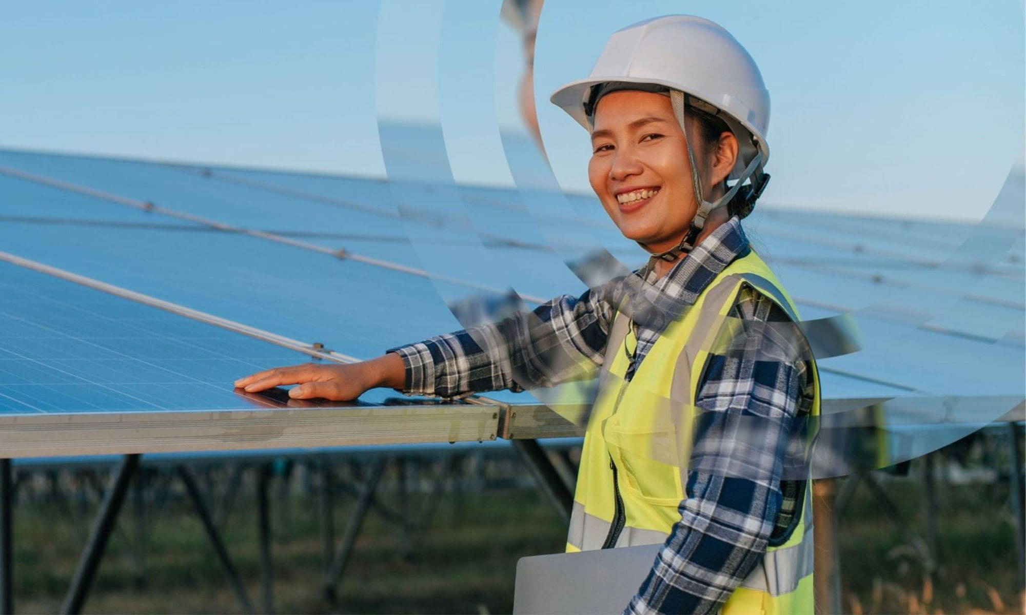 Solar Farm with workers placing panels at ersg